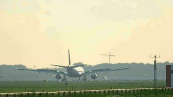 AMSTERDAM, THE NETHERLANDS JULY 25, 2017 - Delta Airlines Airbus 330 N813NW braking after landing at runway 06 Kaagbaan at sunrise. Shiphol Airport, Amsterdam, Holland video