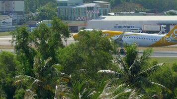 PHUKET, THAILAND NOVEMBER 30, 2019 - Scoot Airbus A320 approaching and landing on the Phuket airport. video