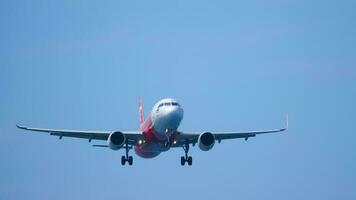 PHUKET, THAILAND NOVEMBER 30, 2018 - AirAsia Airbus A320 HS BBM approaching before landing at Phuket International airport. video