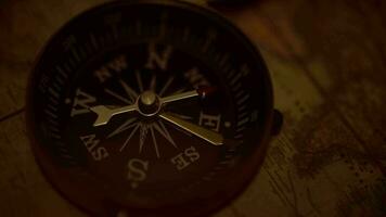 Aged Old World Map and the Old Compass Device. Expedition and Adventure Concept. video