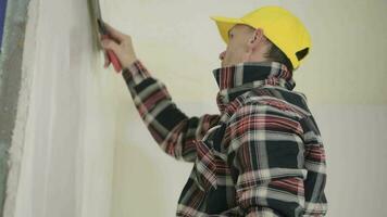 Residential Drywall Patching by Caucasian Worker video