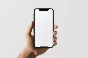 Hand holding smartphone isolated on white background. Created with AI photo