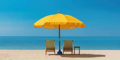 Yellow Umbrella with Beach Chairs on Tropical Beach Blue Sky Background. photo