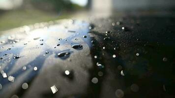 agua gotas en un coche cuerpo pintar video