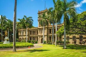 Kamehameha statues and State Supreme Court in Honolulu, hawaii photo