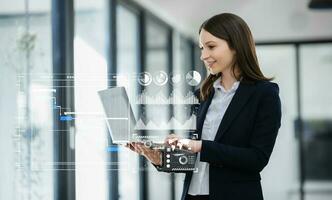 Businesswoman hand Project manager working and update tasks and Gantt chart scheduling virtual diagram.with smart phone, tablet and laptop in office. photo