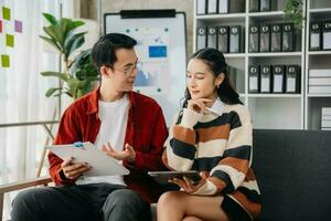 Portrait of success business people working together in home office. Couple teamwork startup concept photo