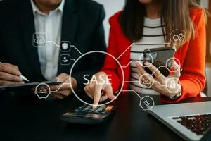 SASE Secure Access Service Edge concept Hand touching Secure Access Service Edge icon on virtual screen background, password, network, framework and support technology in office photo