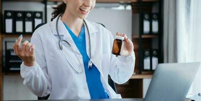 Doctor consulting with patient discussing something and Presenting results on report, Medicine and health care concept. photo