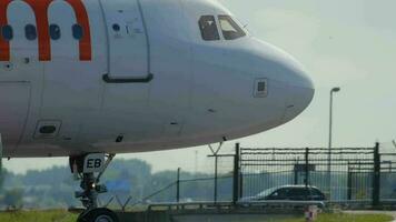 AMSTERDAM, THE NETHERLANDS JULY 26, 2017 - EasyJet Airbus A319 G EZEB, slowing down after landing on runway 18R Polderbaan. Shiphol Airport, Amsterdam, the Netherlands video