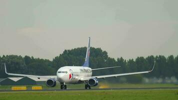 AMSTERDAM, THE NETHERLANDS JULY 24, 2017 - Travel Service Boeing 737 OK TVO Moravian Silesian region livery turn runway before departure at runway 36L Polderbaan video