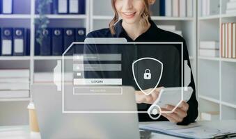 Cyber security concept, Login, User, identification information security and encryption, secure access to user's personal information woman using smart phone and tablet photo