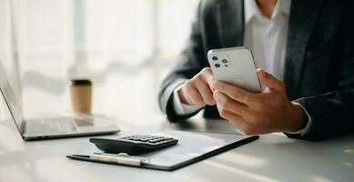 Man using on smartphone and tablet at home as concept photo