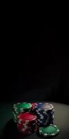 Colorful Poker Chips or Gambling Tokens on Dark Background for Casino Game. Betting on a Better Financial Future, Vertical Banner or Template and Copy Space. Generative AI Technology. photo