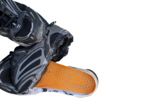 Torn old black shoes on transparent background png