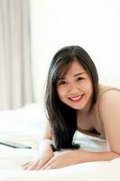 Wake up happy in the morning in bed Enough rest, full sleep, and a smile full of happiness. happy bedroom photo