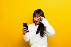 Communicate online with close friends. show a shocked expression Happy chatting online photo