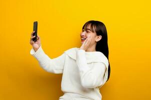 Communicate online with close friends. show a shocked expression Happy chatting online photo