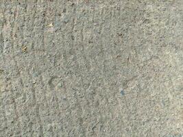 Close-up of grey concrete street texture. Abstract background and texture for design. photo