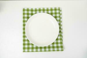 Empty white bowl on white table background. photo