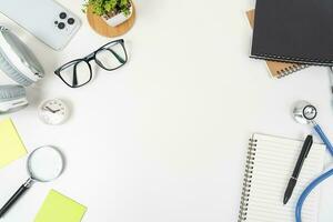 white office desk table Top view with copy space. Flat lay. photo