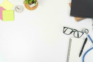 white office desk table Top view with copy space. Flat lay. photo