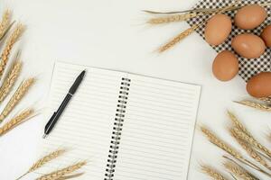 wheat on white table background top view photo