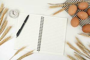 wheat on white table background top view photo