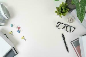 white office desk table Top view with copy space. Flat lay. photo