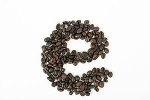 top view of coffee beans on white table photo