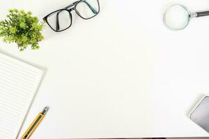 white office desk table Top view with copy space. Flat lay. photo