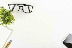 white office desk table Top view with copy space. Flat lay. photo