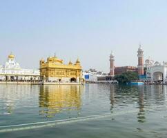 Beautiful view of Golden Temple - Harmandir Sahib in Amritsar, Punjab, India, Famous indian sikh landmark, Golden Temple, the main sanctuary of Sikhs in Amritsar, India photo