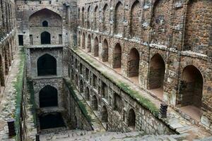 Agrasen Ki Baoli - Step Well situated in the middle of Connaught placed New Delhi India, Old Ancient archaeology Construction photo