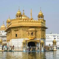 Beautiful view of Golden Temple - Harmandir Sahib in Amritsar, Punjab, India, Famous indian sikh landmark, Golden Temple, the main sanctuary of Sikhs in Amritsar, India photo