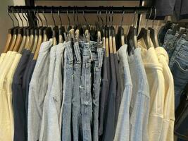 men's clothes on a hanger in a store photo