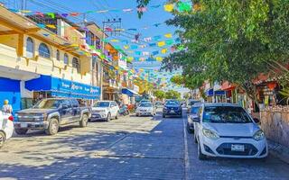 Puerto Escondido Oaxaca Mexico 2023 Typical beautiful colorful tourist street sidewalk city Puerto Escondido Mexico. photo