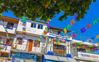 Puerto Escondido Oaxaca Mexico 2023 Typical beautiful colorful tourist street sidewalk city Puerto Escondido Mexico. photo