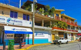 Puerto Escondido Oaxaca Mexico 2023 Typical beautiful colorful tourist street sidewalk city Puerto Escondido Mexico. photo