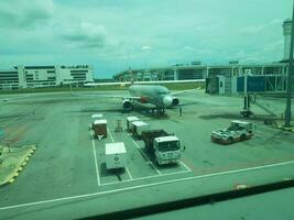 Kuala Lumpur, Malaysia in May 2023. The runway and apron of KLIA terminal 2 Airport. photo