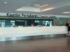 Kuala Lumpur, Malaysia in May 2023. Transfer counter at KLIA Airport Terminal 2 photo