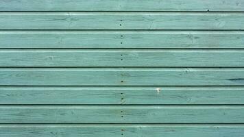 Rustic vintage surface green  color paint wood texture background photo