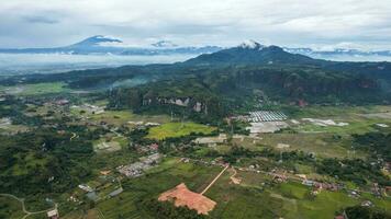 Aerial view of a beautiful landscape view of Harau Valley with mountains valley and grass view, Beautiful Minangkabau. West Sumatera, Indonesia, january 26, 2023 photo