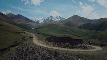 Highlands With Clouds And Snow-Capped Peaks, Aerial View video