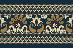 Ikat floral paisley embroidery on navy blue background.Ikat ethnic oriental pattern traditional.Aztec style abstract vector illustration.design for texture,fabric,clothing,wrapping,decoration,sarong.