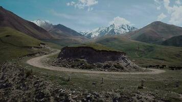 Highlands With Clouds And Snow-Capped Peaks, Aerial View video