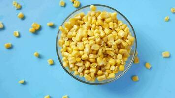 Sweet corns in a bowl on table video