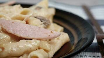 homemade cooked pasta in a plate on table video