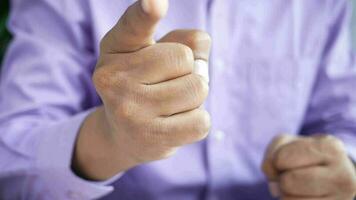 Young businessman in suit point finger at camera video