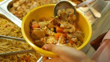 young woman using spoon to pick healthy food video